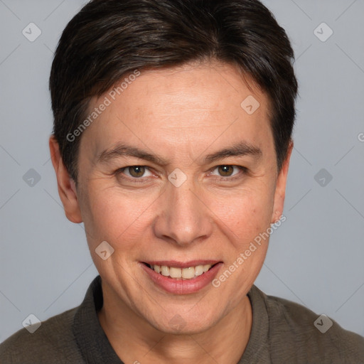 Joyful white adult female with short  brown hair and brown eyes