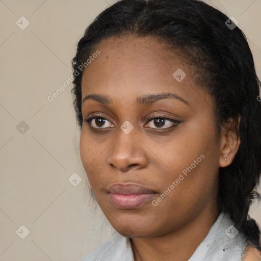 Joyful black young-adult female with medium  black hair and brown eyes