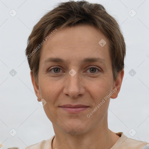 Joyful white adult female with short  brown hair and brown eyes