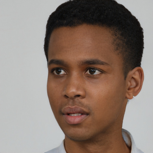 Neutral black young-adult male with short  black hair and brown eyes