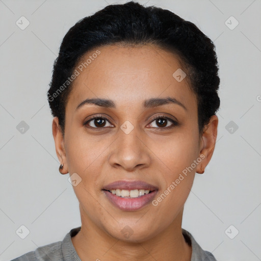 Joyful latino young-adult female with short  black hair and brown eyes