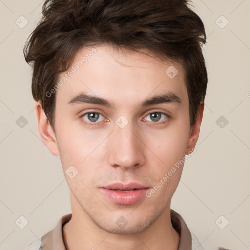 Neutral white young-adult male with short  brown hair and brown eyes