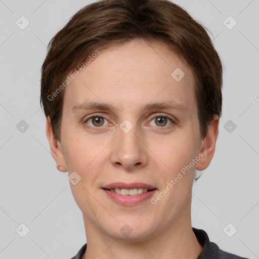 Joyful white young-adult female with short  brown hair and grey eyes