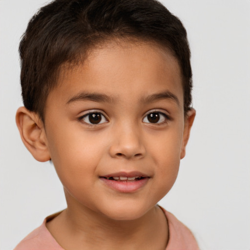 Joyful white child female with short  brown hair and brown eyes