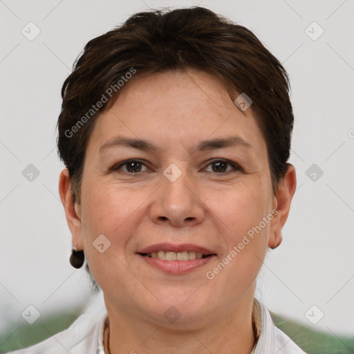 Joyful white adult female with short  brown hair and brown eyes