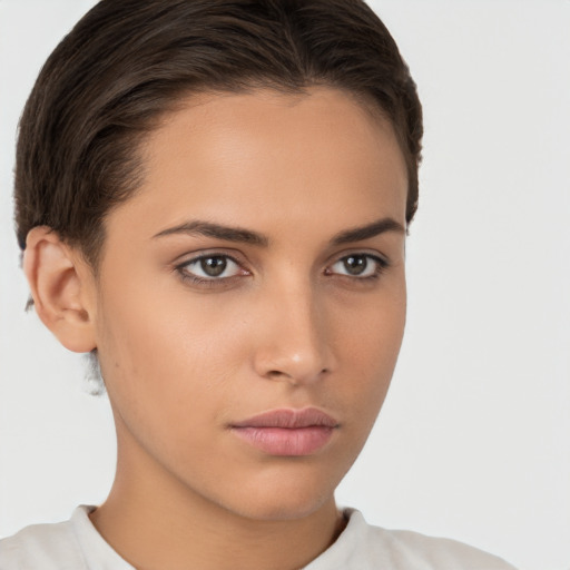 Neutral white young-adult female with short  brown hair and brown eyes