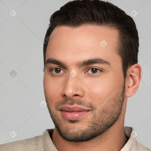 Joyful white young-adult male with short  brown hair and brown eyes