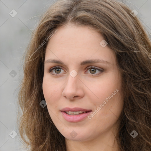 Joyful white young-adult female with long  brown hair and green eyes