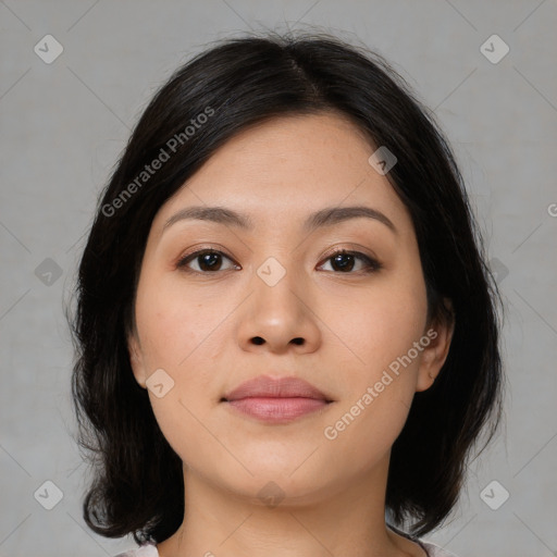 Joyful asian young-adult female with medium  black hair and brown eyes