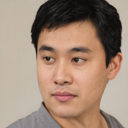 Neutral asian young-adult male with short  black hair and brown eyes