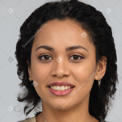 Joyful latino young-adult female with long  black hair and brown eyes