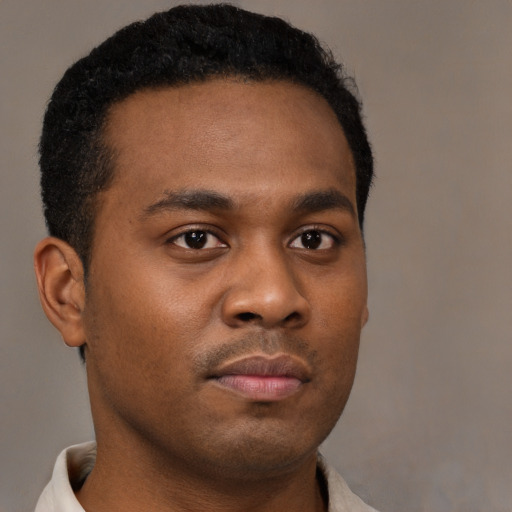 Neutral black young-adult male with short  brown hair and brown eyes