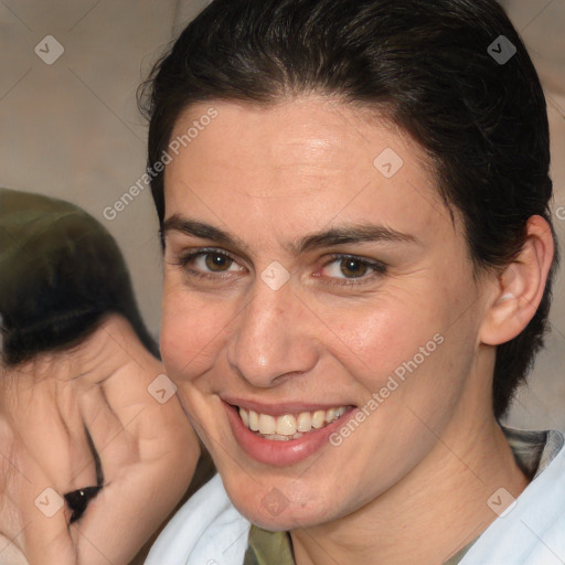 Joyful white adult female with medium  brown hair and brown eyes