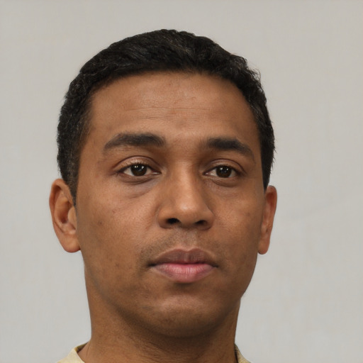 Neutral black young-adult male with short  brown hair and brown eyes