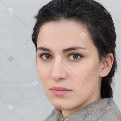 Neutral white young-adult female with medium  brown hair and brown eyes