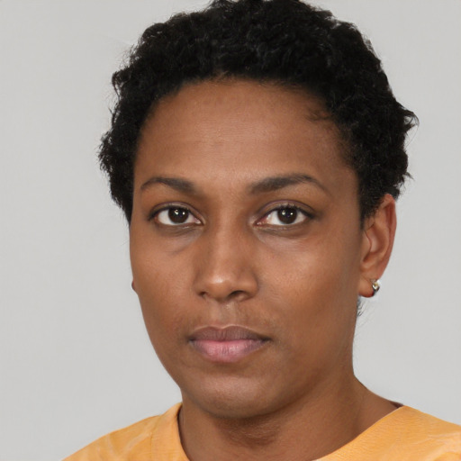 Neutral black young-adult female with short  black hair and brown eyes