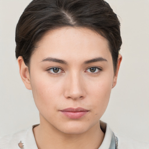 Neutral white young-adult female with short  brown hair and brown eyes