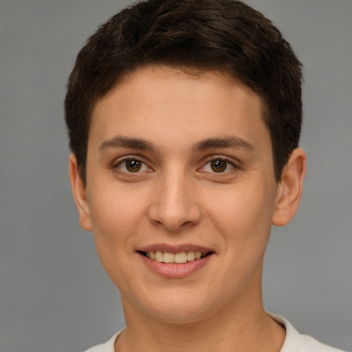 Joyful white young-adult female with short  brown hair and brown eyes