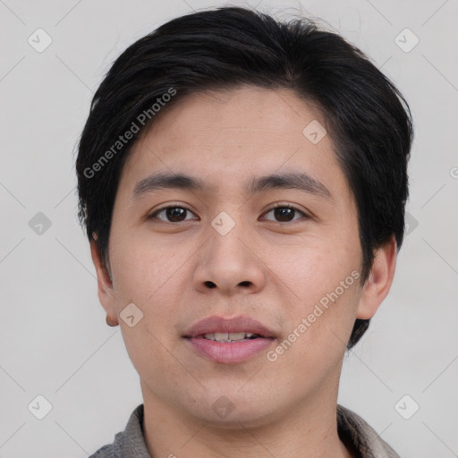 Joyful asian young-adult male with short  brown hair and brown eyes