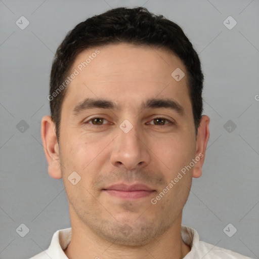 Joyful white young-adult male with short  brown hair and brown eyes