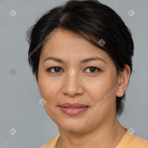 Joyful asian young-adult female with short  brown hair and brown eyes