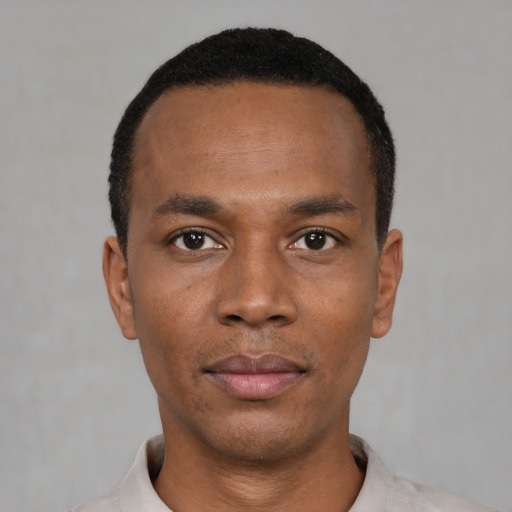 Neutral black young-adult male with short  black hair and brown eyes
