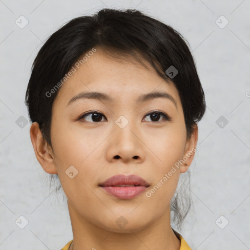 Joyful asian young-adult female with short  brown hair and brown eyes