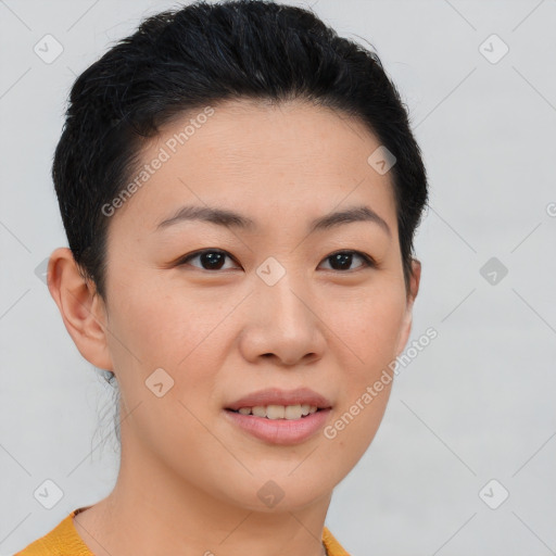 Joyful asian young-adult female with short  brown hair and brown eyes