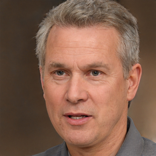 Neutral white middle-aged male with short  brown hair and brown eyes