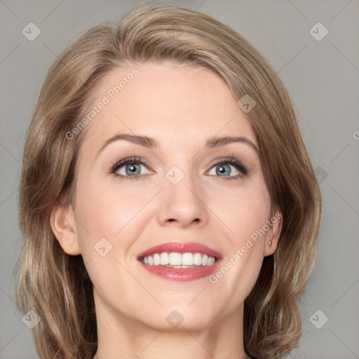 Joyful white young-adult female with medium  brown hair and green eyes