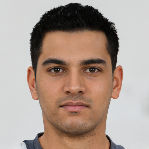 Neutral latino young-adult male with short  black hair and brown eyes