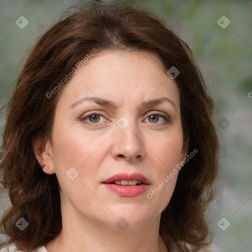 Joyful white young-adult female with medium  brown hair and green eyes