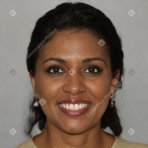 Joyful black young-adult female with medium  brown hair and brown eyes