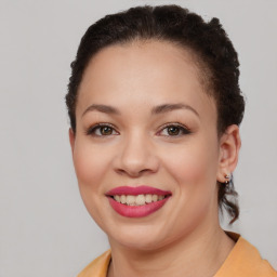 Joyful latino young-adult female with short  brown hair and brown eyes