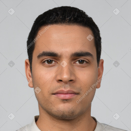 Neutral latino young-adult male with short  black hair and brown eyes