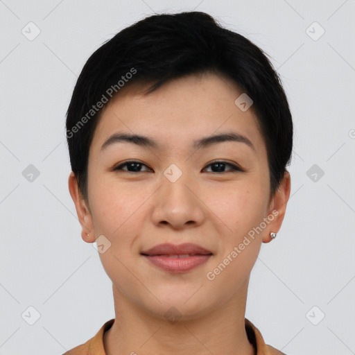 Joyful asian young-adult female with short  black hair and brown eyes