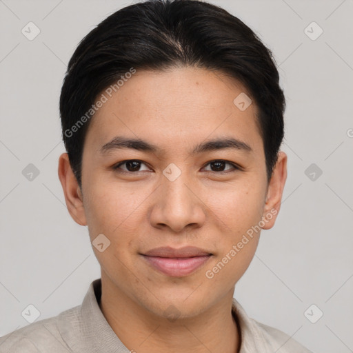 Joyful asian young-adult male with short  brown hair and brown eyes