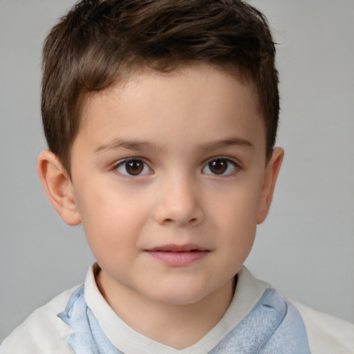 Joyful white child male with short  brown hair and brown eyes