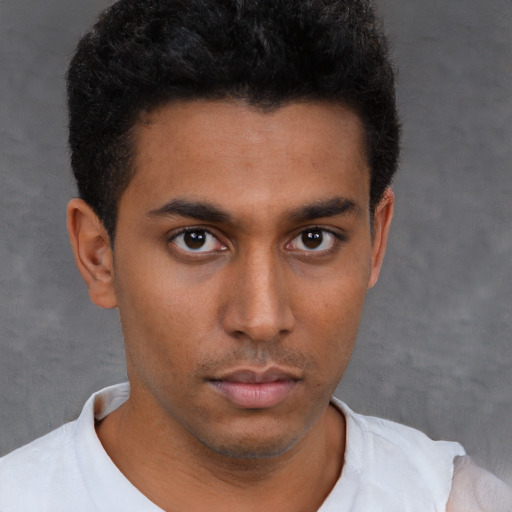 Neutral black young-adult male with short  brown hair and brown eyes