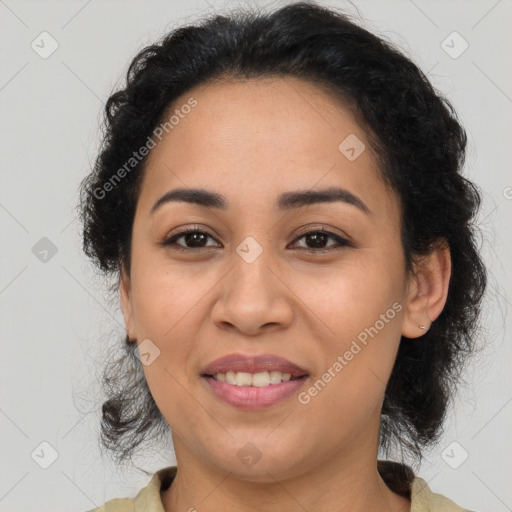 Joyful latino young-adult female with medium  brown hair and brown eyes