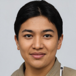 Joyful asian young-adult female with short  black hair and brown eyes