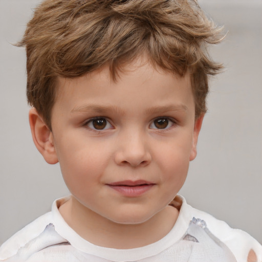 Joyful white child male with short  brown hair and brown eyes