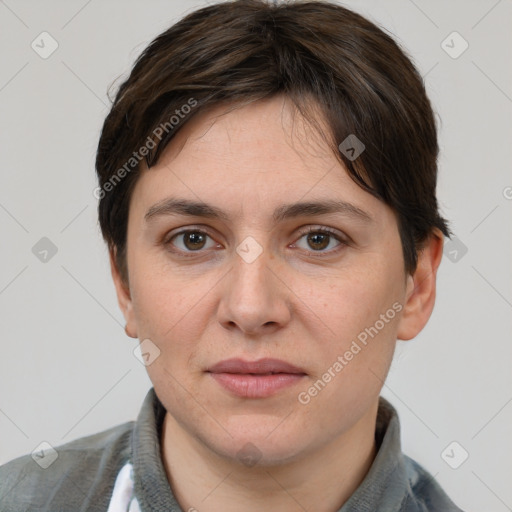 Joyful white adult female with short  brown hair and brown eyes