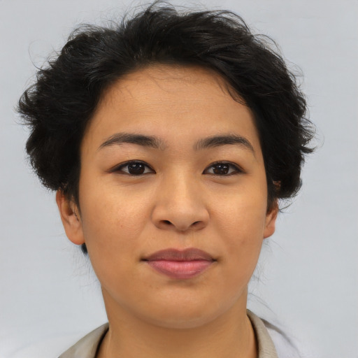 Joyful asian young-adult female with short  brown hair and brown eyes