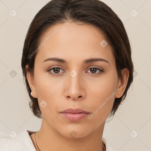 Neutral white young-adult female with medium  brown hair and brown eyes