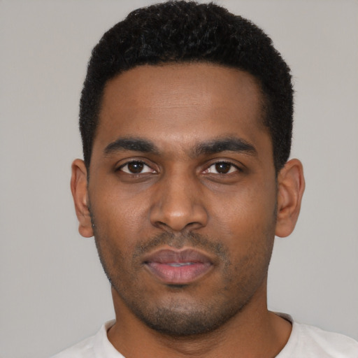 Neutral black young-adult male with short  black hair and brown eyes