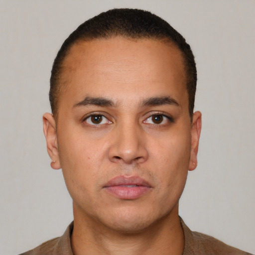 Neutral latino young-adult male with short  brown hair and brown eyes