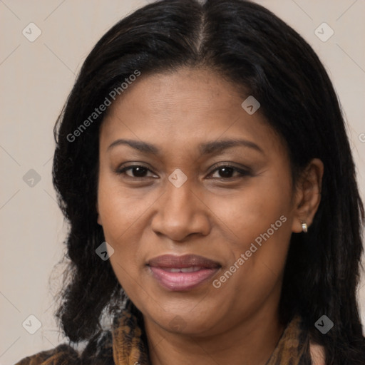 Joyful black adult female with medium  brown hair and brown eyes