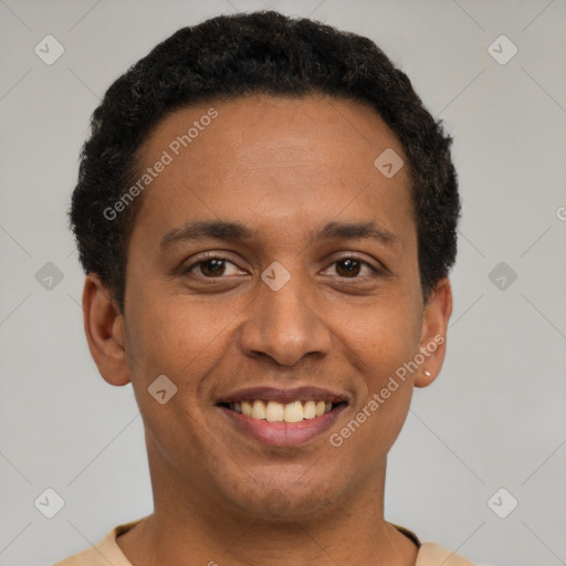 Joyful latino young-adult male with short  brown hair and brown eyes