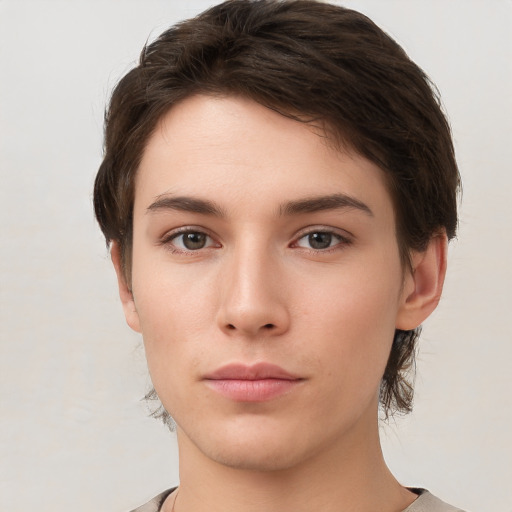 Neutral white young-adult female with short  brown hair and brown eyes